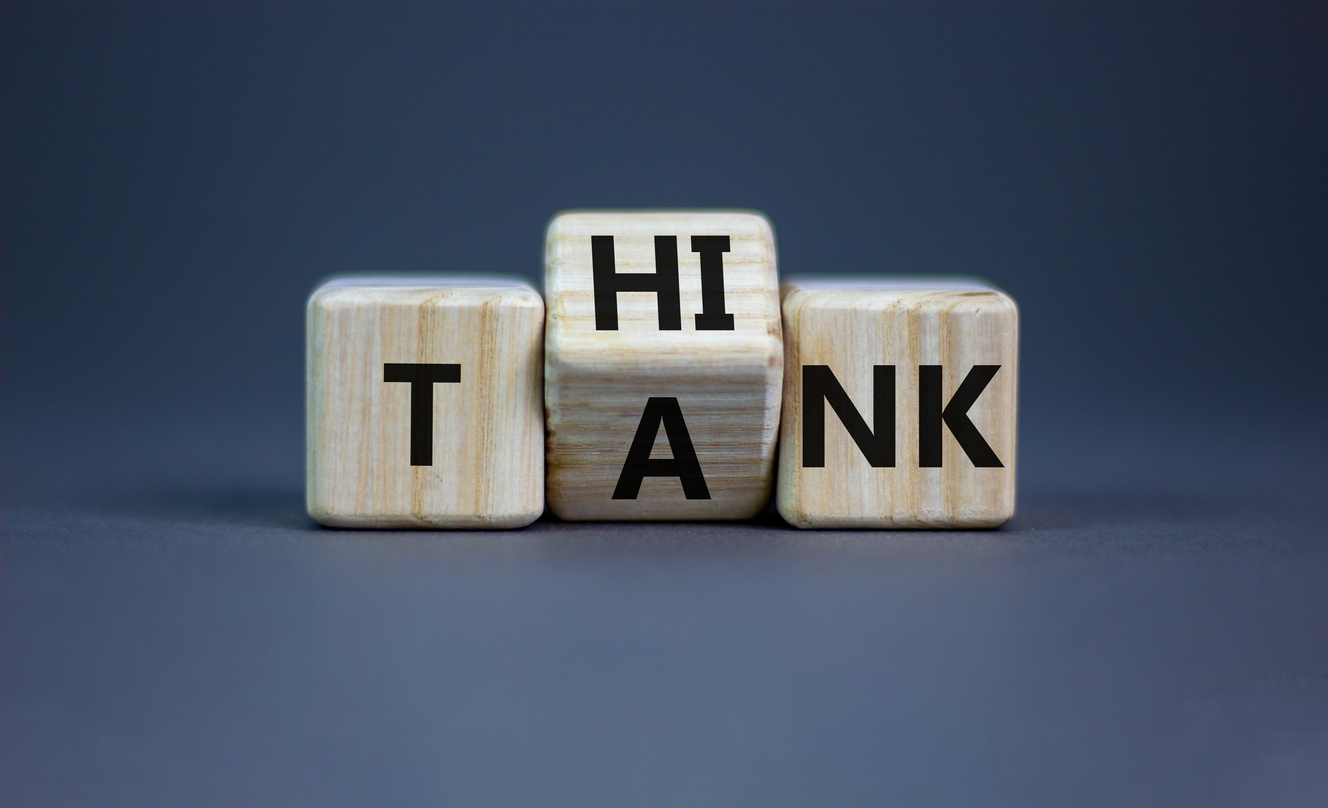 Think,Tank,Symbol.,Businessman,Turns,A,Wooden,Cube,And,Changes